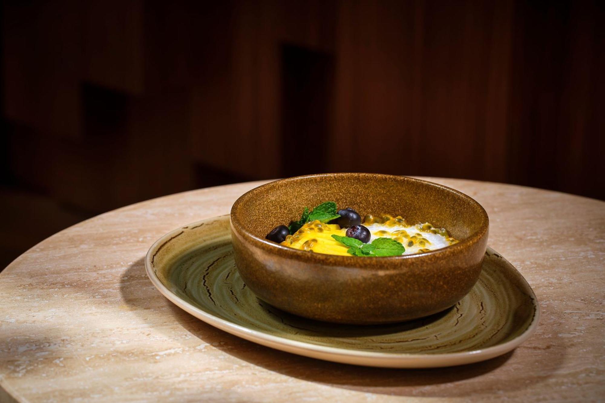 The Ritz-Carlton Ras Al Khaimah, Al Wadi Desert Екстериор снимка A bowl of yogurt with honey and blueberries